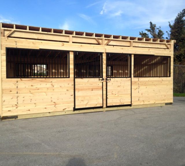 side_aisle_barn_befor_delivery_stall_fronts